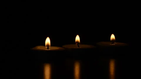 Candles shining in the dark with customizable space for... Stock Footage 295292879