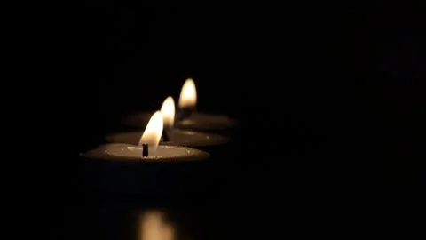 Candles shining in the dark with customizable space for... Stock Footage 295292937