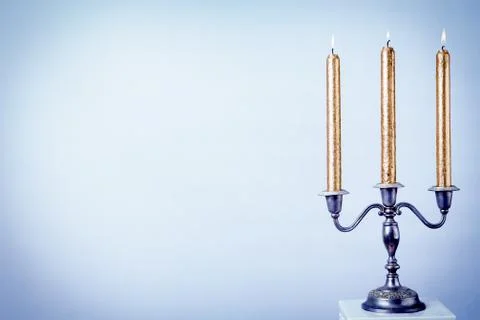 Candles in a Silver Candelabra Stock Photos