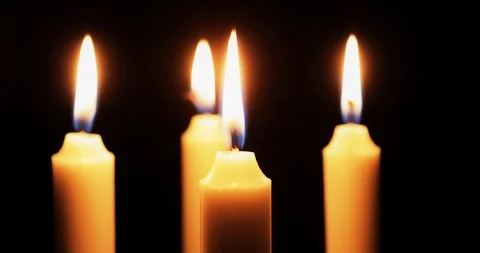 Candles slowly moving around. Stock Footage 98627288
