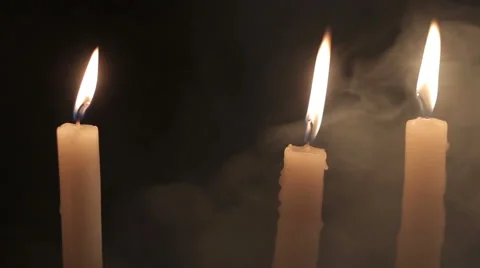 Candles With Smoke On Black Background Video stock 48976736