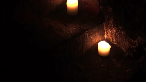 Candles on the steps of an old staircase. Stock Footage 123624199