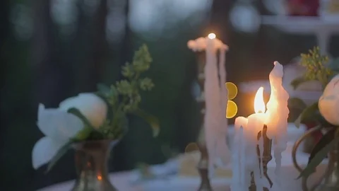 Candles on the table in the forest Video stock 76322293
