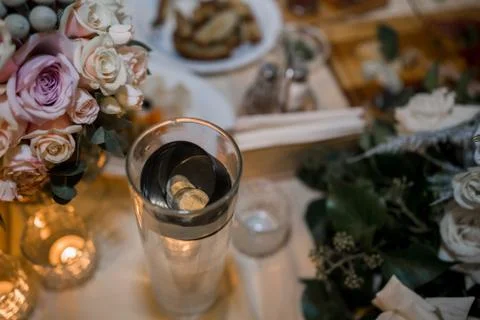 Candles on a table in a restaurant with decor Stock Photos