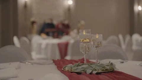 Candles on the table in the wedding hall close-up Stock-Footage 253104896