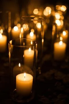 Candles on the table at the wedding party Stock Photos