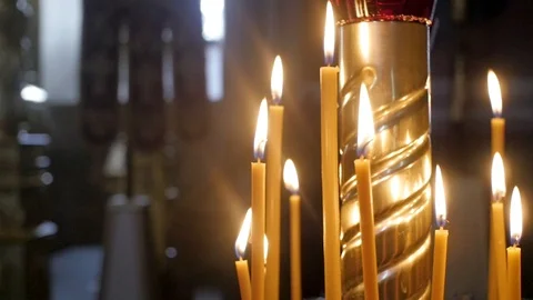 Candles in the temple for prayer Stock Footage 93664067