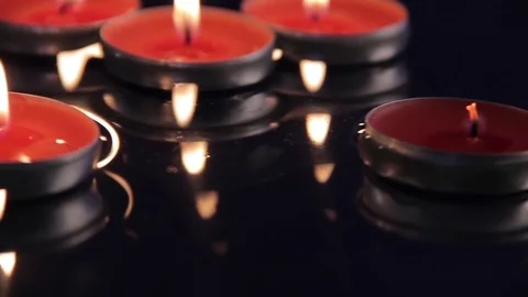 Candles on the water Stock Footage 76397710