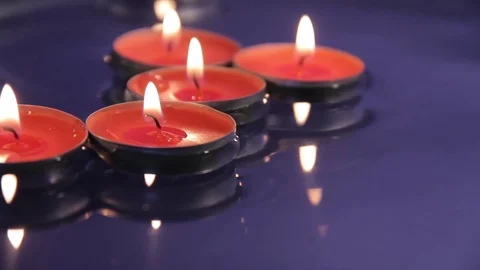 Candles on the water Stock Footage 76397829