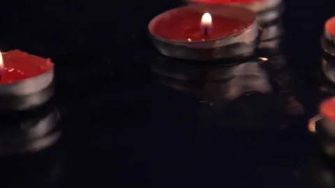 Candles on the water Stock Footage 76398280