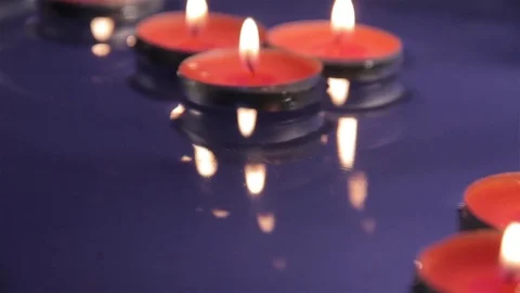 Candles on the water Stock Footage 76398328