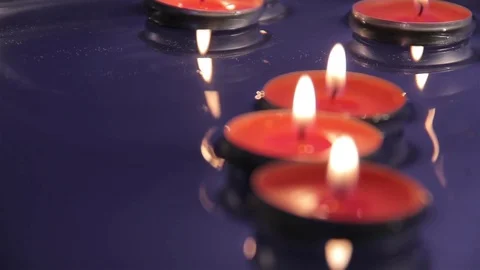 Candles on the water Stock Footage 76398331