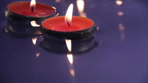 Candles on the water Stock Footage 76398433