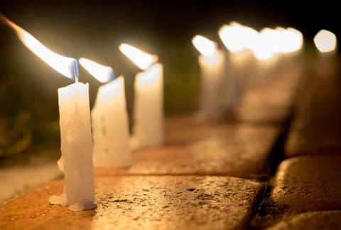 CANDLES ON THE WIND Stock Photos