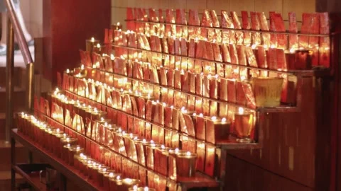 Candles for worship lit in a buddhist temple at Jakarta's Chinatown area Video stock 326305053