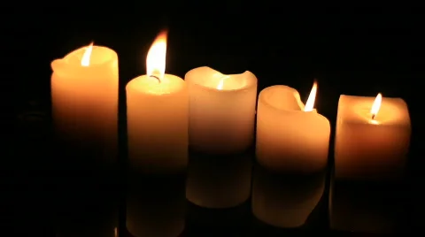 CandlesReflected off Rippling Water Stock Footage 826100