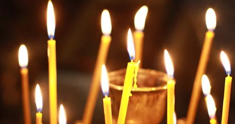 Candlestick with candles in the church Video stock 243775479
