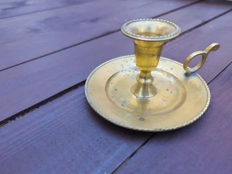 A candlestick on the table Stock Photos