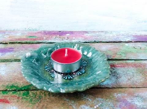 Candlestick with tea candle Stock Photos