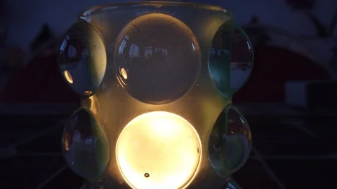 Candlestick vase that glows around Stock Footage 122360400