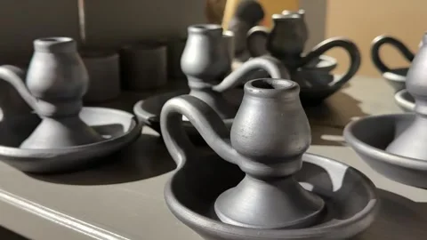 Candlesticks Decorated statues in asian style on the table Stock Footage 326464941