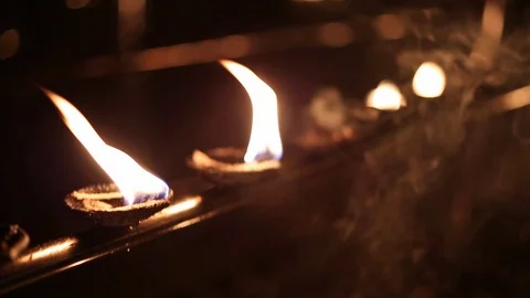 Candlesticks in flame in the Indian temple Video stock 79095516