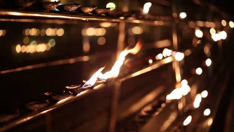 Candlesticks in flame in the Indian temple Stock-Footage 79095807