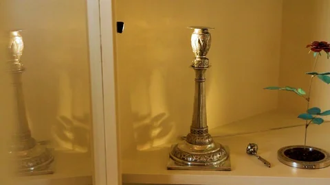 Candlesticks with flower Stock Footage 89477911