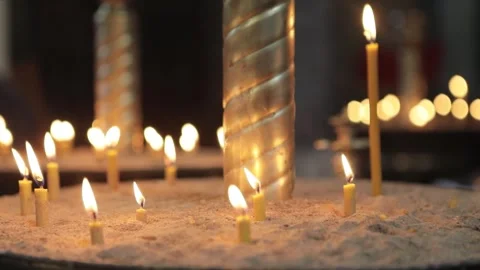 Candlesticks Full of Burning Candles in an Orthodox Church Video stock 241321955
