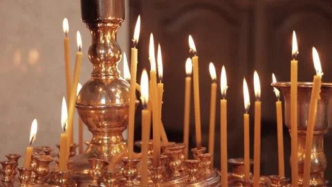 Candlesticks Full of Burning Candles in an Orthodox Church Video stock 300493279