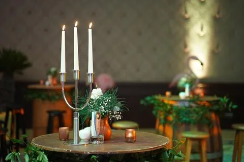 Candlestik on bistro table Stock Photos