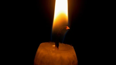 Candlewick Macro. Candle flame on black background isolated Stockbeeldmateriaal 122863522