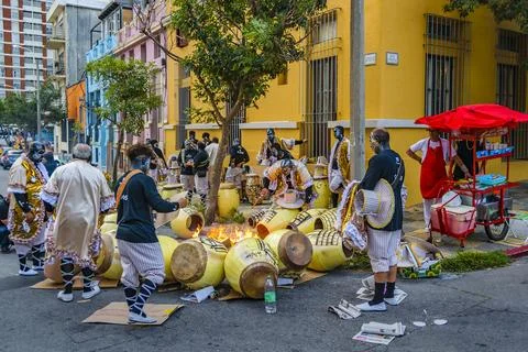 Candombe drummers tempering drums, montevideo, carnival Stock Photos