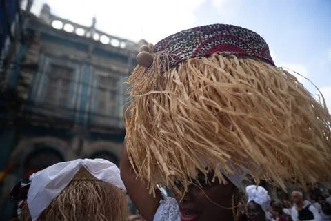 Candomble devotee in procession for Omolu and Obaluae Stock Photos