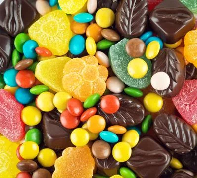 Candy and chocolates closeup Stock Photos