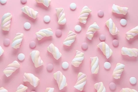 Candy and marshmallow, abstract pattern on pastel pink background Stock Photos