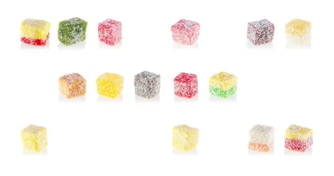 Candy appears and disappears randomly on a white background Stock Footage 140132527