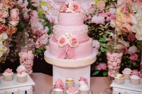 Candy bar and wedding cake. Table with sweets, buffet with cupcakes, candies Stock Photos