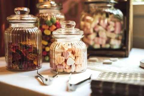 Candy bar. Close up of glassware with different chewy candies and marshmallows Stock Photos