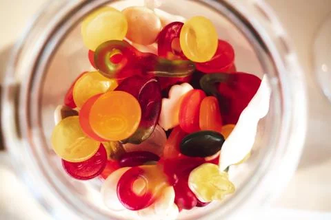 Candy bar. Close up top view of sweet gummy candies various colors and taste in Stock Photos