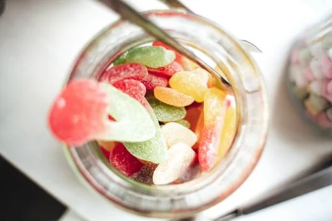 Candy bar. Close up top view of sweet gummy candies various colors and taste in Stock Photos
