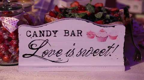 Candy bar sign in rack focus Stock Footage 63545498