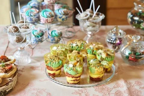 Candy bar, sweet buffet table, champagne snacks Stock Photos