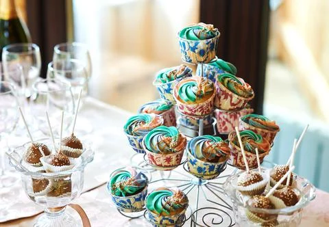 Candy bar, sweet buffet table, champagne snacks Stock Photos