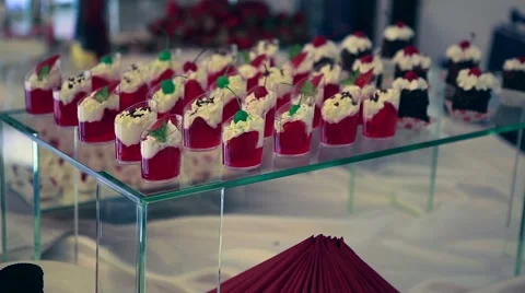 Candy bar. Table with sweet 
candies. Wedding cake Video stock 64771781