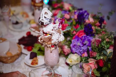 Candy bar. Table with sweets, buffet with cupcakes, candies, dessert. Stock Photos