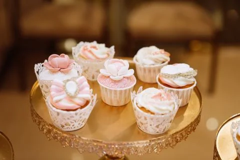 Candy bar. Table with sweets, buffet with cupcakes, candies, dessert Stock Photos