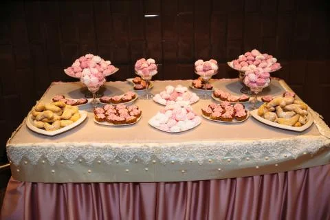 Candy bar. Table with sweets, candies, dessert Stock Photos
