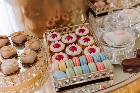 Candy bar. Table with sweets, candies, dessert. cakes and berries in the ca.. Stock Photos