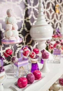 Candy bar. Table with sweets on the wedding day Stock Photos